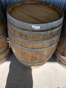 lot 153 image: 1 WhiskeyWine Barrels ( W 26 x H 35 approx.) High end Designer barrels great for outdoor tables.