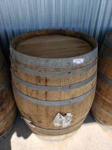 lot 154 image: 1 WhiskeyWine Barrels ( W 26 x H 35 approx.) High end Designer barrels great for outdoor tables.