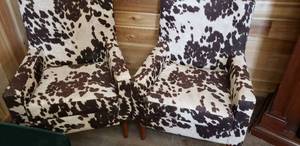 lot 135 image: Cow Print Upholstered Arm Chairs (W 27 x D 32 x H 35 approx) (2 total)