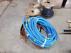 lot 378 image: 4 Rolls of Wire and partial roll of Plastic 34 Flex Conduit 1 - 10-2 With Grnd, 1 - 14 AWG Blue, 1 - Commscope R-6 Type Wire, Large and Normal Gauge, 1 - Priority Wire
