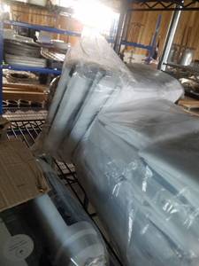 lot 249 image: Unused Bib White Cloth Aprons, 24 Total,  2 Inline Ice Filters, Glass Vases, 5 total