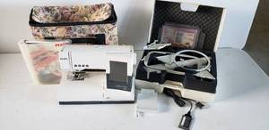 lot 247 image: Pfaff Creative 2144 with an on board LCD screen SewingEmbroidery Machine, comes with manual and accessories