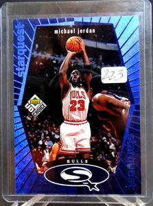lot 223 image: Michael Jordan RARE BLUE FOIL STARQUEST INSERT 1998 UPPER DECK #SQ30 - Mint
