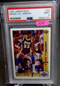 lot 238 image: LOW POP - PSA 9 MINT 1991-92 UPPER DECK #34 MAGIC JOHNSON VS MICHAEL JORDAN CONFRONTATION