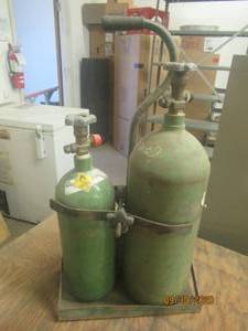 lot 270 image: DUO OXYGEN , COMPRESSED TANKS WITH TANK HOLDER&nbsp