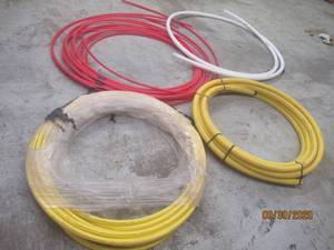lot 278 image: TOTAL OF 4 LARGE DRISCOPLEX PRESSURE GAS PIPES ZURN PEX WATER PIPES&nbsp&nbspYELLOW, RED ,WHITE&nbsp