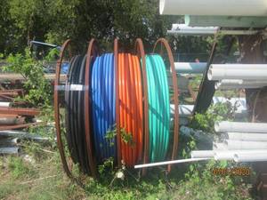 lot 337 image: SPOOL OF BLACK ,BLUE ORANGE AND GREEN&nbsp AGRICULTURALFARM&nbsp HOSES&nbsp