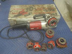lot 390 image: RIGID 600 WITH 6 ATTACHMENTS AND CASE