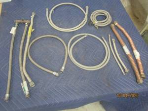 lot 456 image: TOTAL OF 11 WATER HEATER , AND FAUCET CONNECTORS&nbsp