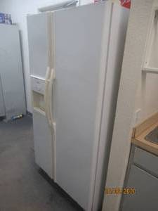 lot 642 image: WHIRLPOOL SIDE BY SIDE REFRIGERTOR CONTENTS NOT INCLUDED