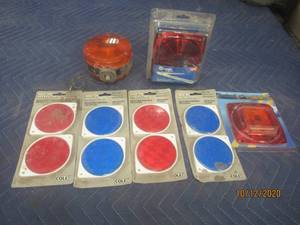 lot 670 image: TOTAL OF 7&nbsp NAIL ON REFLECTORS  STOP TAIL LAMPS  REPLACEMENT LENS KIT