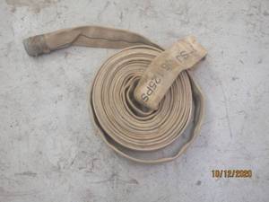 lot 674 image: CLOTH WATER HOSE 125 PSI&nbsp