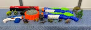 lot 12 image: Water Guns, Nerf Gun and Various Dinosaur figurines