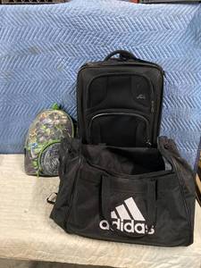 lot 233 image: Suitcase, Duffel Bag, and childs backpack