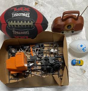 lot 92 image: Truck Model Kit Spalding Regulation XFL Football, Small Radio