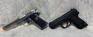 lot 158 image: 2 Airsoft Pistols, black one does not have magazine