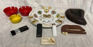 lot 180 image: Ashtrays, Tobacco Roller, Lighters and matches