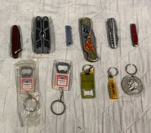 lot 186 image: Several Pocket Knives, key chains, and can openers