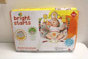 lot 90 image: Bright Starts Baby Bouncer w playful pinwheels