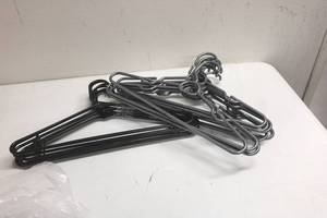lot 69 image: Clothes Hangers Black and Silver (15 total)