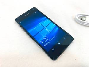 lot 260 image: Cricket Microsoft Windows Touchscreen Phone 16GB w charging cable