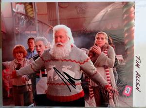 lot 118 image: AUTOGRAPH - TIM ALLEN HAND SIGNED 8 X 10 SANTA CLAUS PHOTO