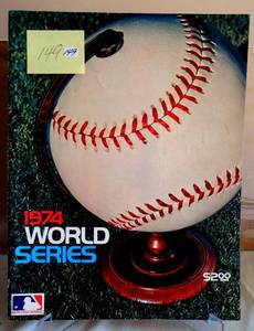 lot 149 image: RARE - 1974 WORLD SERIES PROGRAM SIGNED BY AL BUMBRY AND BROOKS ROBINSON FROM THE BALTIMORE ORIOLES