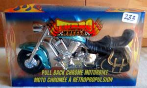lot 233 image: TURBO WHEELS PULL BACK CHROME MOTORBIKE - NIB