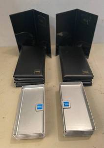 lot 48 image: 12 Black Guest Check Presenters, 11 check presenters and tip tray