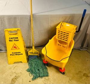 lot 116 image: Mop Bucket with side press wringer, mop and mophead, Caution Wet Floor Sign