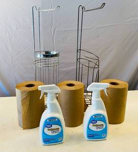 lot 137 image: Bathroom Items 2 Metal toilet paper storage and holders, 3 rolls of paper towels. And 2 full bottles of bathroom cleaner