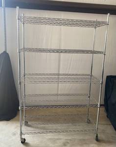 lot 12 image: Metro bakers rack Chrome 5 Tier Metal wire shelving with wheels