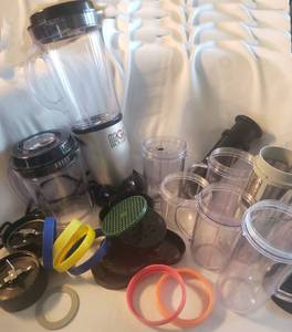 lot 6 image: Magic  Bullet & Huge Lot of accessories  including the MAGIC BULLET 10 second Recipes
