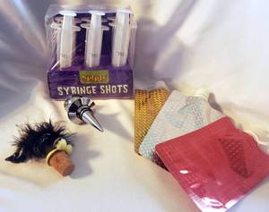 lot 17 image: Bar Fun Stuff  2 wine Stoppers, Shot Syringe