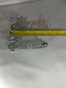 lot 55 image: 1970 CADILLAC ELDORADO EMBLEMS