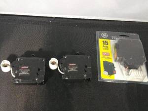 lot 138 image: TWO 20A AND ONE 15A CIRCUIT BREAKERS