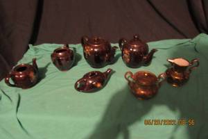 lot 91 image: JAPANESE INSPIRED TEAPOTS