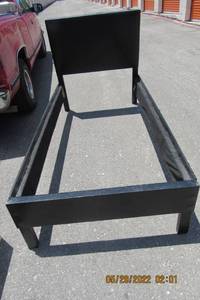 lot 73 image: BLACK VINYL TWIN BED FRAME-WITH SLATS-39W X 78L
