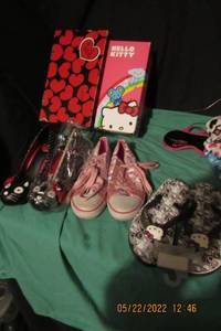 lot 141 image: HELLO KITTY- SNEAKERS, FLIP FLOPS, AND BLACK KITTY HEELS