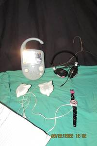 lot 136 image: HELLO KITTY-HEAD PHONES, RADIO SPEAKERS,  AND WATCH