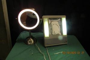 lot 61 image: CONAIR LARGE 2 WAY LIGHTED MAKEUP MIRROR AND NORELCO SATIN COLLECTION 4 LAMP SLIME LINE ELECTRONIC SYSTEM