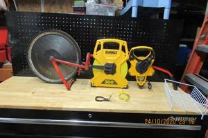 lot 13 image: DEWALT 300 AND 100 PROFESSIONAL SPOOLED MEASURING TAPES AND ROLLATAPE PROFESSIONAL LOT MEASURING WHEELED TAPE WITH FEET COUNTER