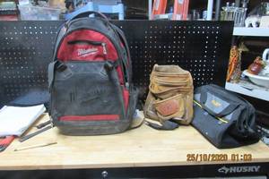 lot 148 image: MILWAUKEE TOOL BACKPACK LEATHER TOOL BELT , AND AWP TOOL BAG