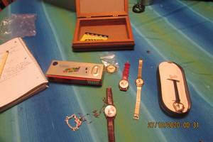 lot 171 image: COLLECTABLE TIME PIECES-DISNEY-POOH, AND TWO MICKEY MOUSE WATCHES, SANTA CLAUS WATCH, BARBIE WATCH IN CASE, HELLO KITTY NECKLACE, NINTENDO SUPER MARIO CAMERA