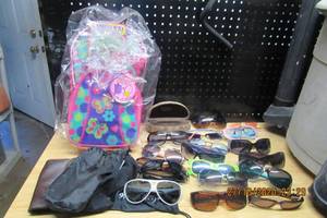 lot 182 image: SUNGLASSES VARIOUS STYLES, AND A CHILDS COMBO BACKPACK AND EASTER BASKET IN PLASTIC