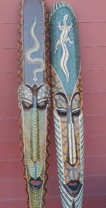 lot 24 image: Two African Wall  TRIBAL MASKS  Art pieces 38L X 8W  FROM BALI