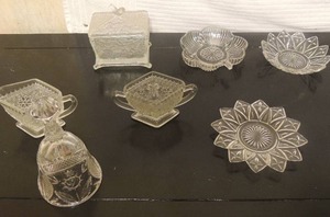 lot 216 image: Crystal bell,   cream & sugar set,  covered bowl AND 3 various STAR DISHES