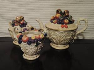 lot 100 image: Fruit design teapot, sugar & creamer