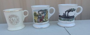 lot 142 image: 3  Shaving Mugs  -  TRAIN, STEAM BOAT, BETTHANIESES COLLEGEII