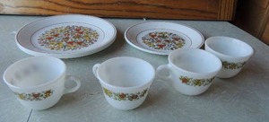 lot 214 image: Correlle dish fall design  - 4 large plates 2 small , 4 cups, set of pirate gold corning S&P shakers in original box